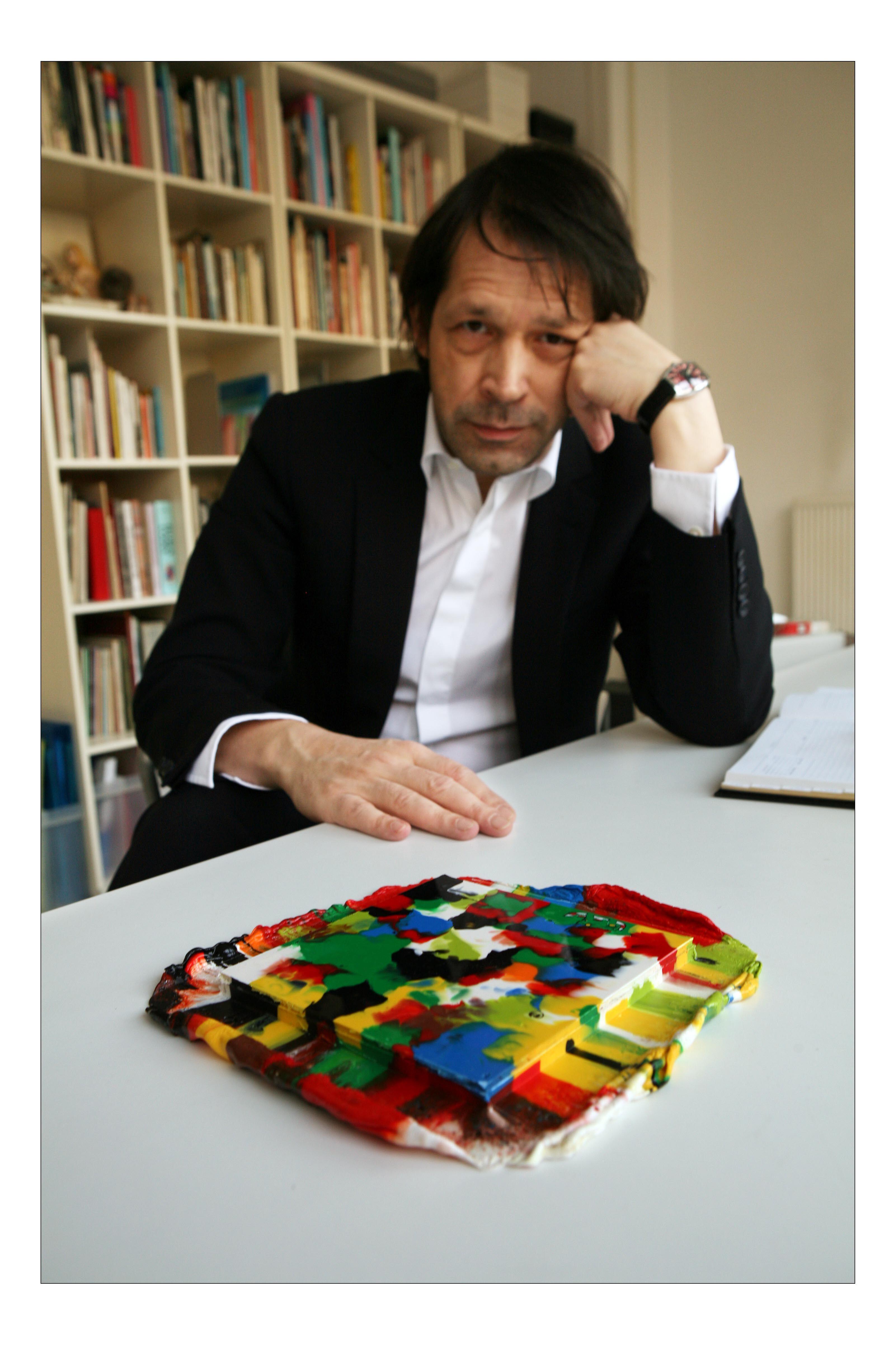 Peter Saville with a melted Lego creation, 2008