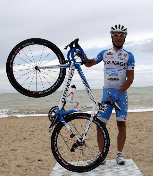 Simone Stortoni (Colnago-CSF Inox) poses by the ocean before the start of stage two