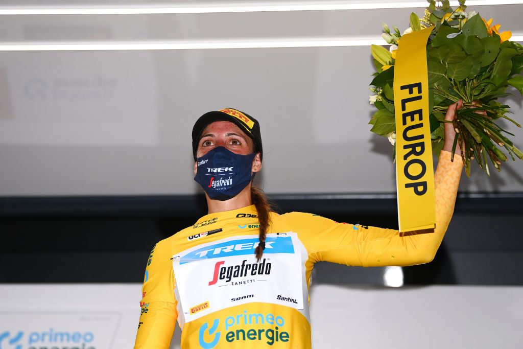 VADUZ SWITZERLAND JUNE 18 Lucinda Brand of The Netherlands and Team Trek Segafredo celebrates at podium as yellow leader jersey winner during the 2nd Tour de Suisse Women 2022 Stage 1 a 46km stage from Vaduz to Vaduz ourdesuisse2022 on June 18 2022 in Vaduz Switzerland Photo by Tim de WaeleGetty Images