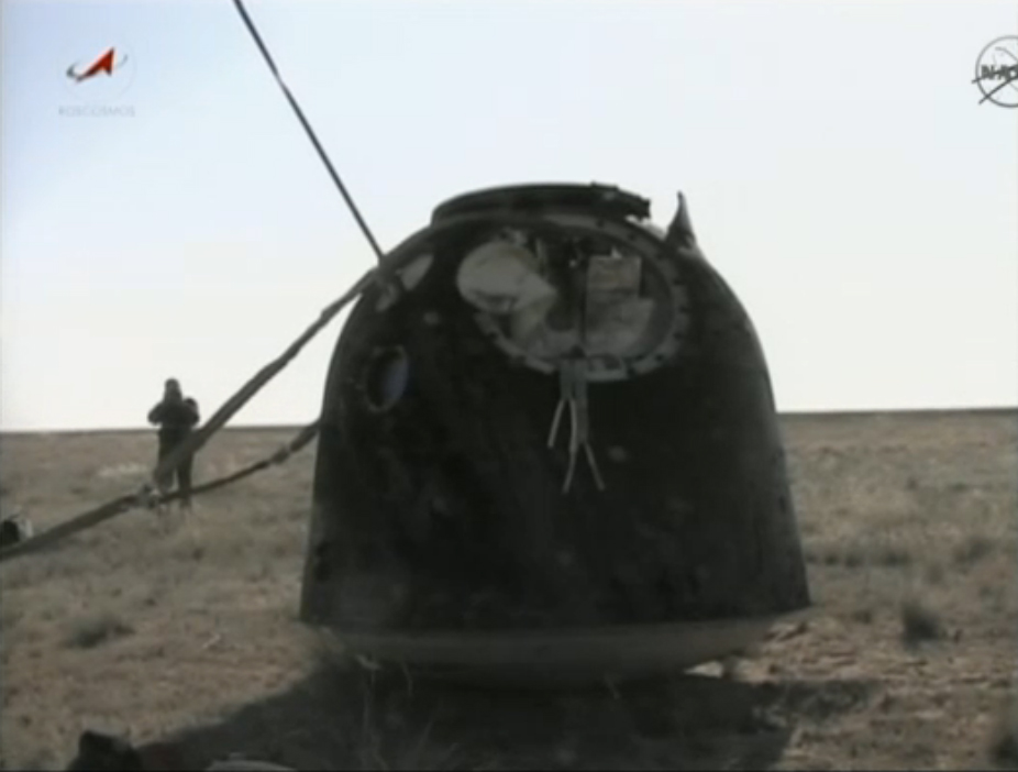 This still from a NASA TV broadcast shows the Soyuz TMA-20 space capsule that landed safely on the steppes of Kazakhstan in central Asia on May 23, 2011 to end the Expedition 27 mission to the International Space Station. The Soyuz landed with Russian cos