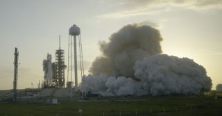 SpaceX test fires the first stage engines of a Falcon 9 rocket on Launch Pad 39A at NASA's Kennedy Space Center in Cape Canaveral, Florida on March 9, 2017. The Falcon 9 rocket will launch the EchoStar 23 communications satellite into orbit on March 14, a