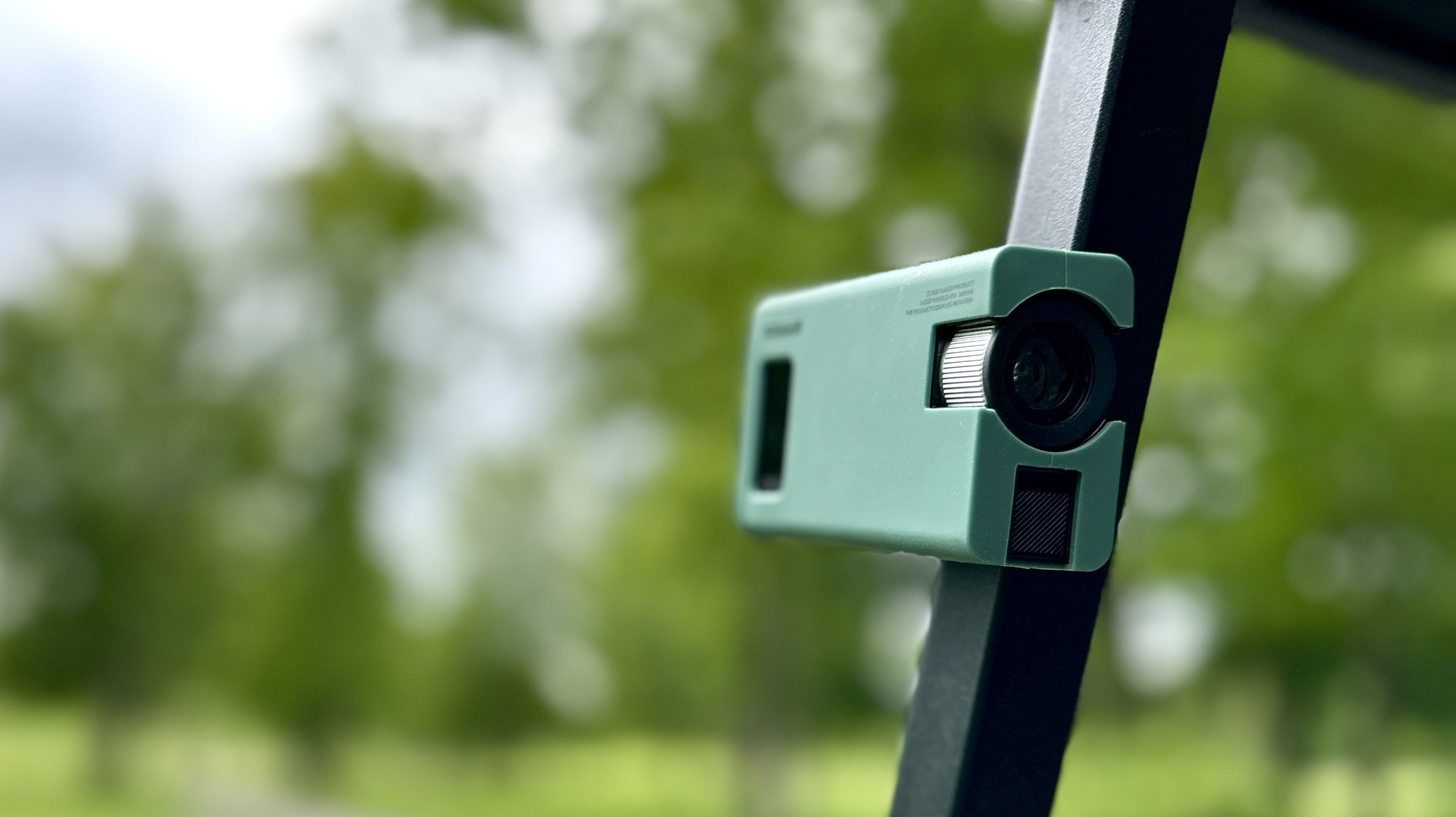 The CaddyTalk Cube rangefinder on a course