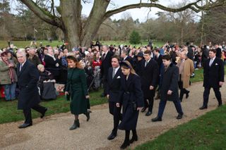 Prince Andrew, Sarah Ferguson, Princess Beatrice and family walking to church on Christmas Day with crowds watching them