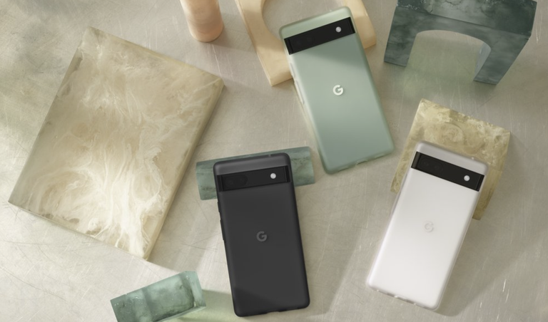 Google Pixel 6a smartphones lying down on slabs of marble