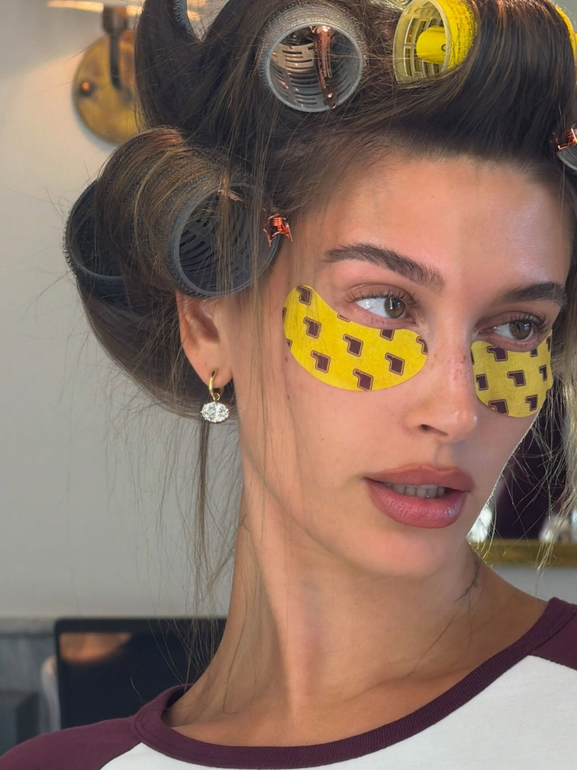 Hailey Bieber wearing her Rhode eye masks