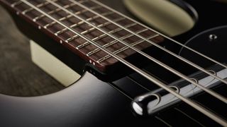 Close-up of Danelectro bass guitar strings