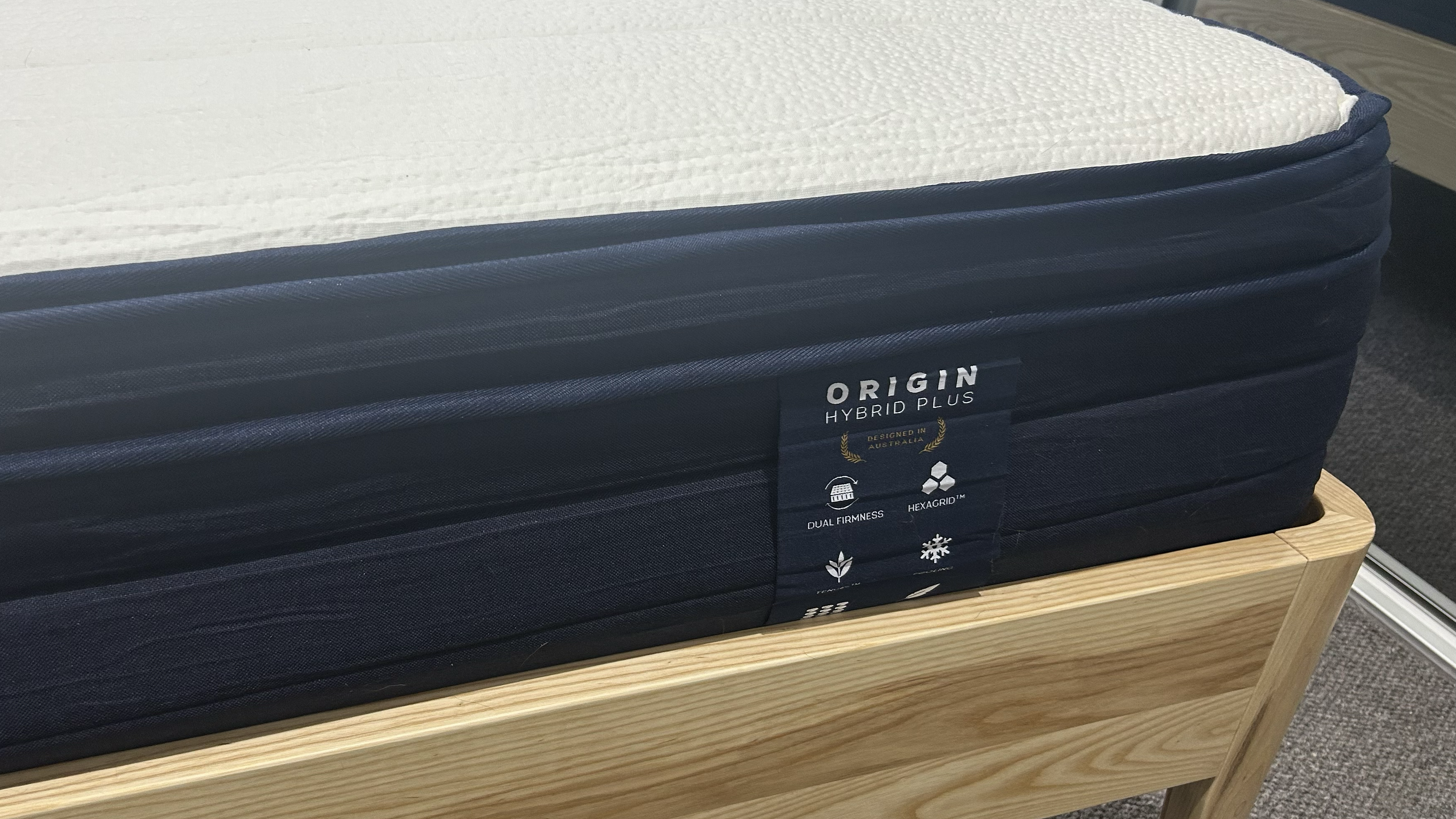 Origin Hybrid Plus on wooden bedframe