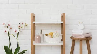 White bathroom with wooden details