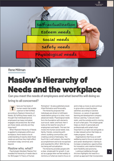 Business man writing on a transparent board with Maslow's hierarchy of needs listed on it in colourful blocks