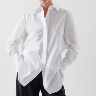 model wearing white oversized shirt