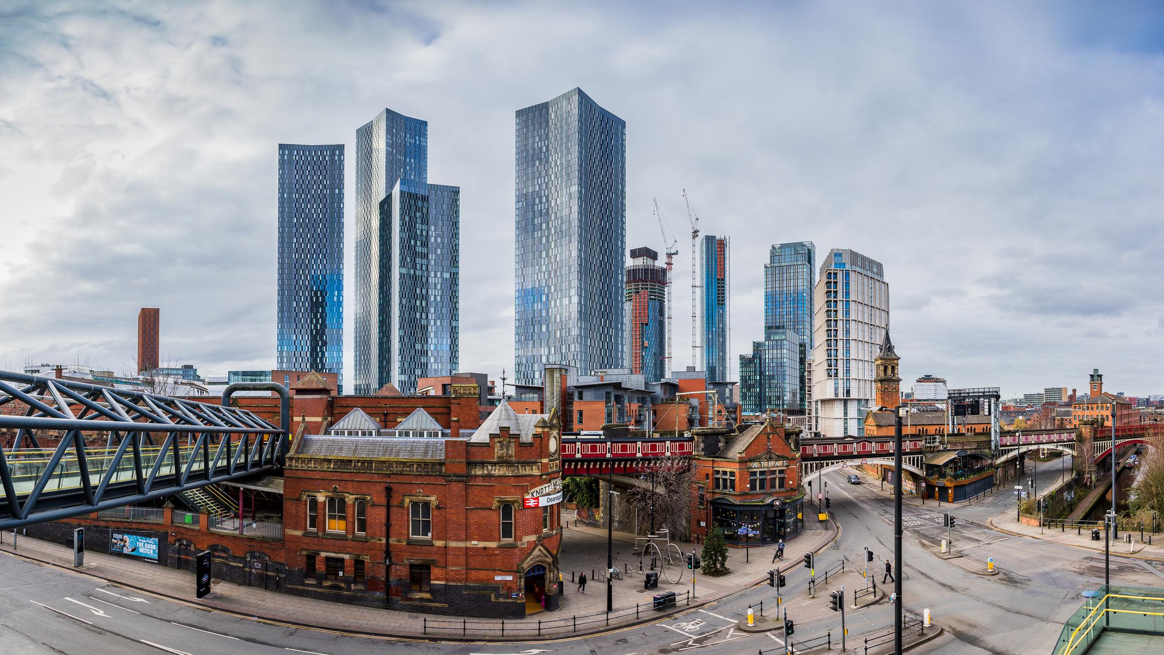  A multi image panorama of Deansgate in Manchester taken in February 2023 backed by the Deansgate Square skyscraper complex. 