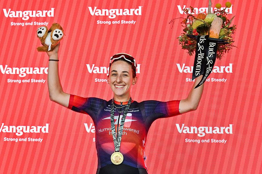Human Powered Health rider Maggie Coles-Lyster of Canada celebrates on the podium after wining the Women's One-Day Race of the Tour Down Under UCI Women's Cycling race in Adelaide on January 21, 2026. (Photo by Brenton Edwards / AFP) / - IMAGE RESTRICTED TO EDITORIAL USE - STRICTLY NO COMMERCIAL USE -