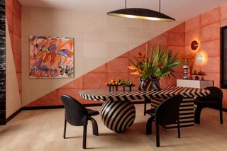 A salmon pink dining room