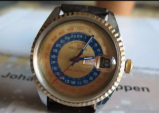 a wristwatch whose face is divided into 100 even divisions