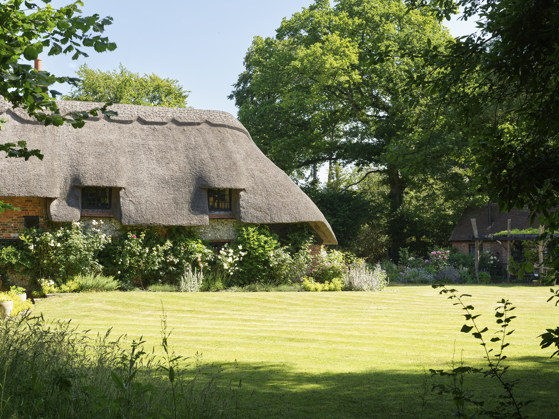 Images of Thatch, a house that looks a bit like Claudia Winkleman 