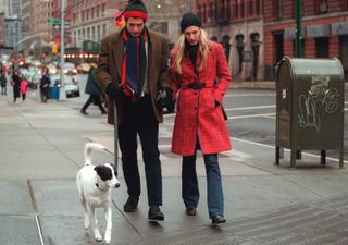 John F. Kennedy Jr and Carolyn Bessette walk their dog in New York