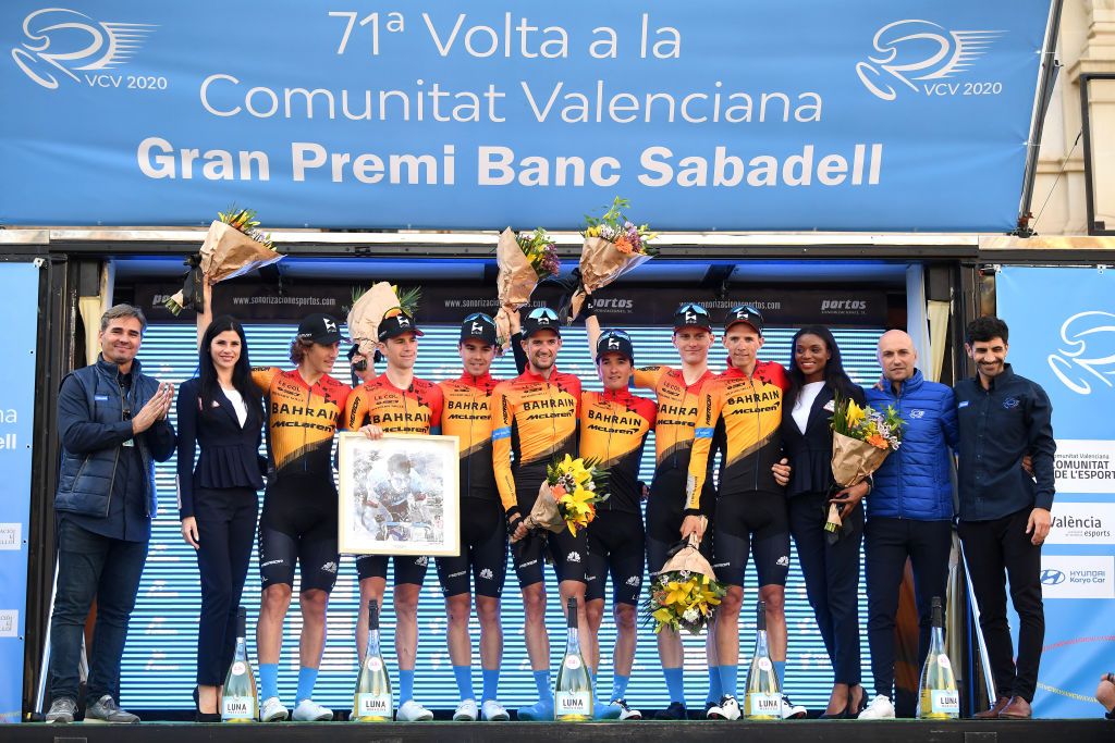 VALENCIA SPAIN FEBRUARY 09 Podium Scott Davies of The United Kingdom and Team BahrainMclaren Ivan Garcia Cortina of Spain and Team BahrainMclaren Kevin Inkelaar of The Netherlands and Team BahrainMclaren Matej Mohoric of Slovenia and Team BahrainMclaren Pello Bilbao of Spain and Team BahrainMclaren Wout Poels of The Netherlands and Team BahrainMclaren Dylan Teuns of Belgium and Team BahrainMclaren Best Team Celebration during the 71st Volta a la Comunitat Valenciana 2020 Stage 5 a 977km stage from Paterna Valencia VueltaCV VCV2020 on February 09 2020 in Valencia Spain Photo by David RamosGetty Images