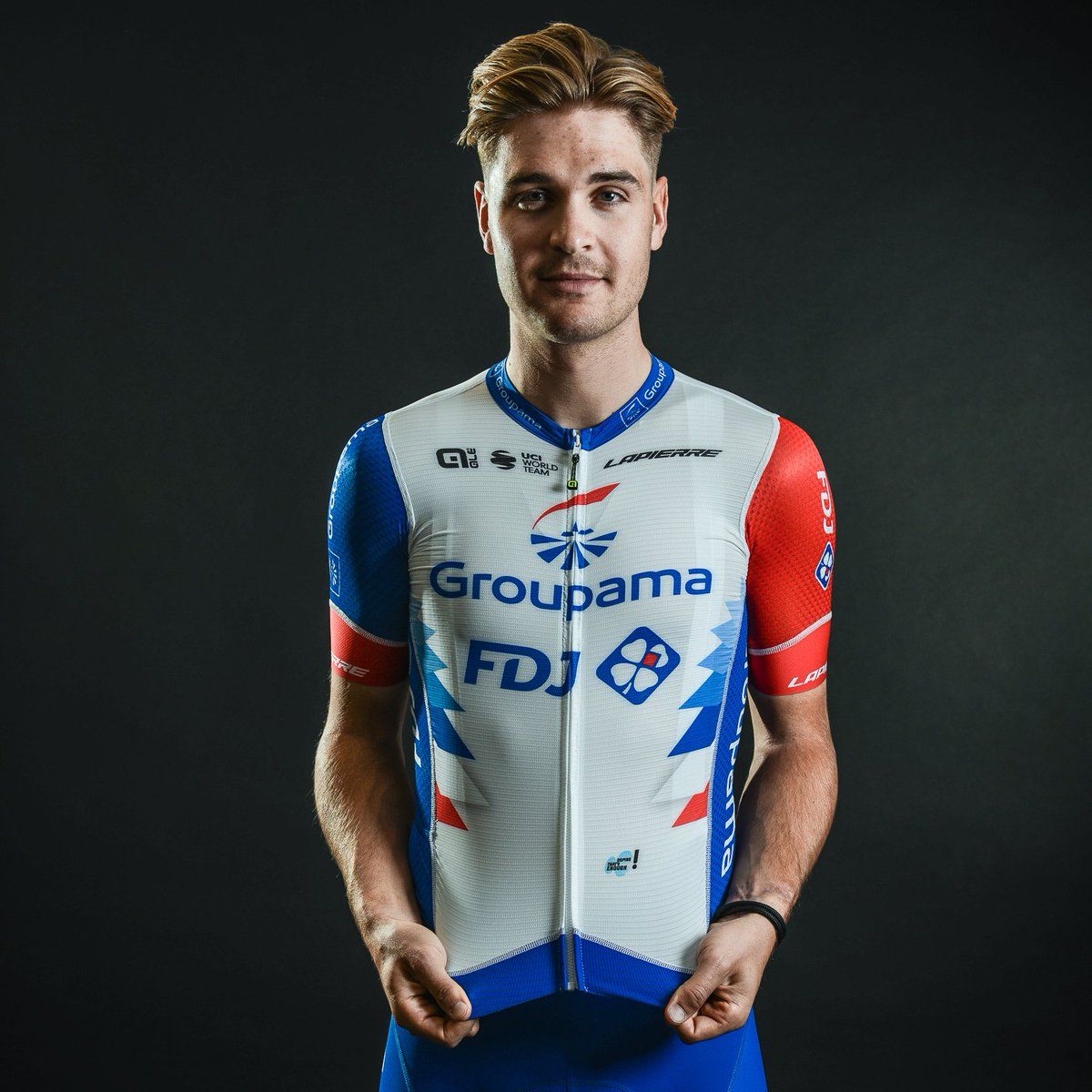 Bram Welten models the 2022 Groupama-FDJ kit