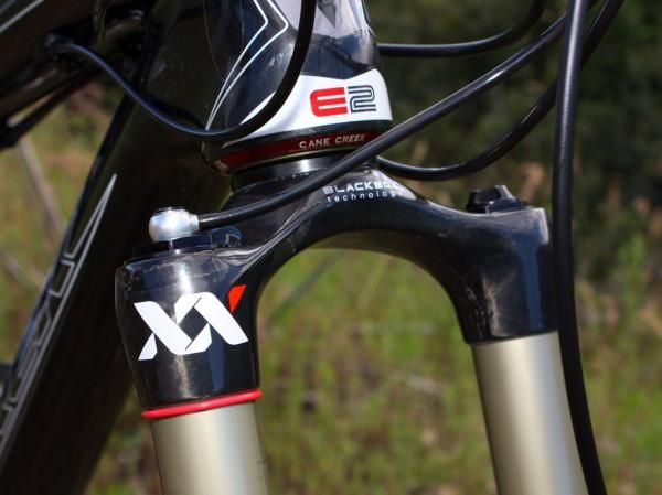 The RockShox Revelation XX World Cup's one-piece tapered carbon fiber steerer and crown includes an aluminum spacer to provide a square surface for the crown race.