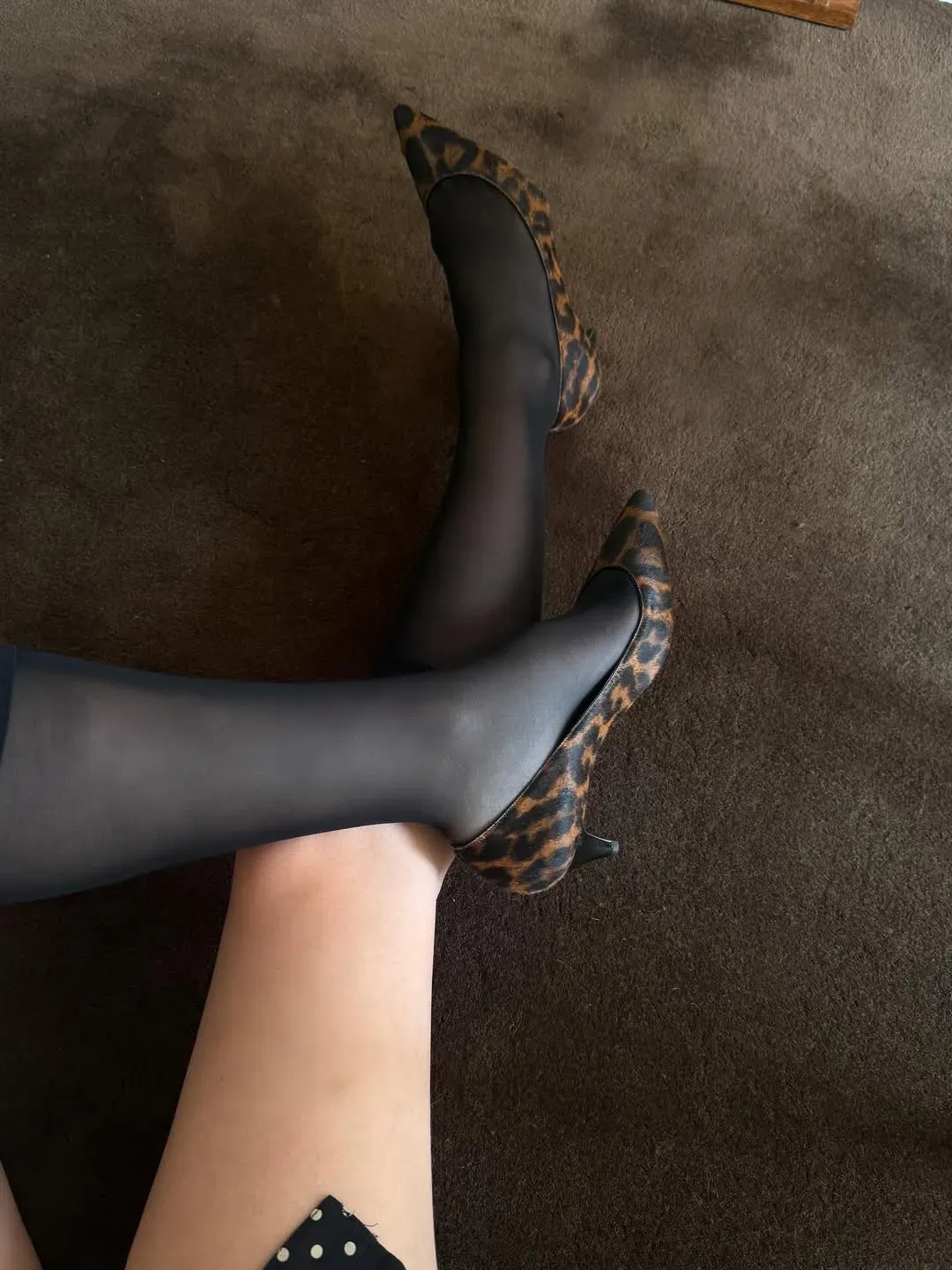 Woman wearing pony hair leopard print pump
