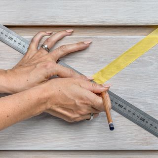 measurement marking with scale on wooden table