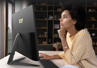 Woman using Acer Aspire C24 All-in-One