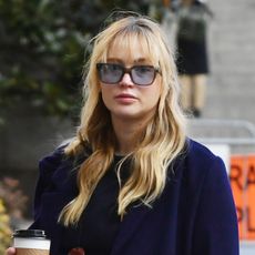 Jennifer Lawrence wears a The Row duffel coat