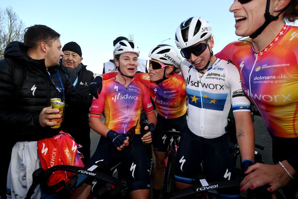 SD Worx teammates Lotte Kopecky, Demi Volllering, Lorena Wiebes and Marlen Reusser celebrate after the finish