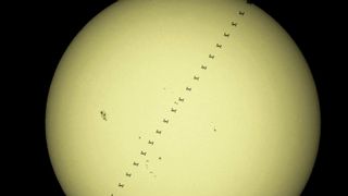 ISS Crosses Face of Sun by Dale Mayotte