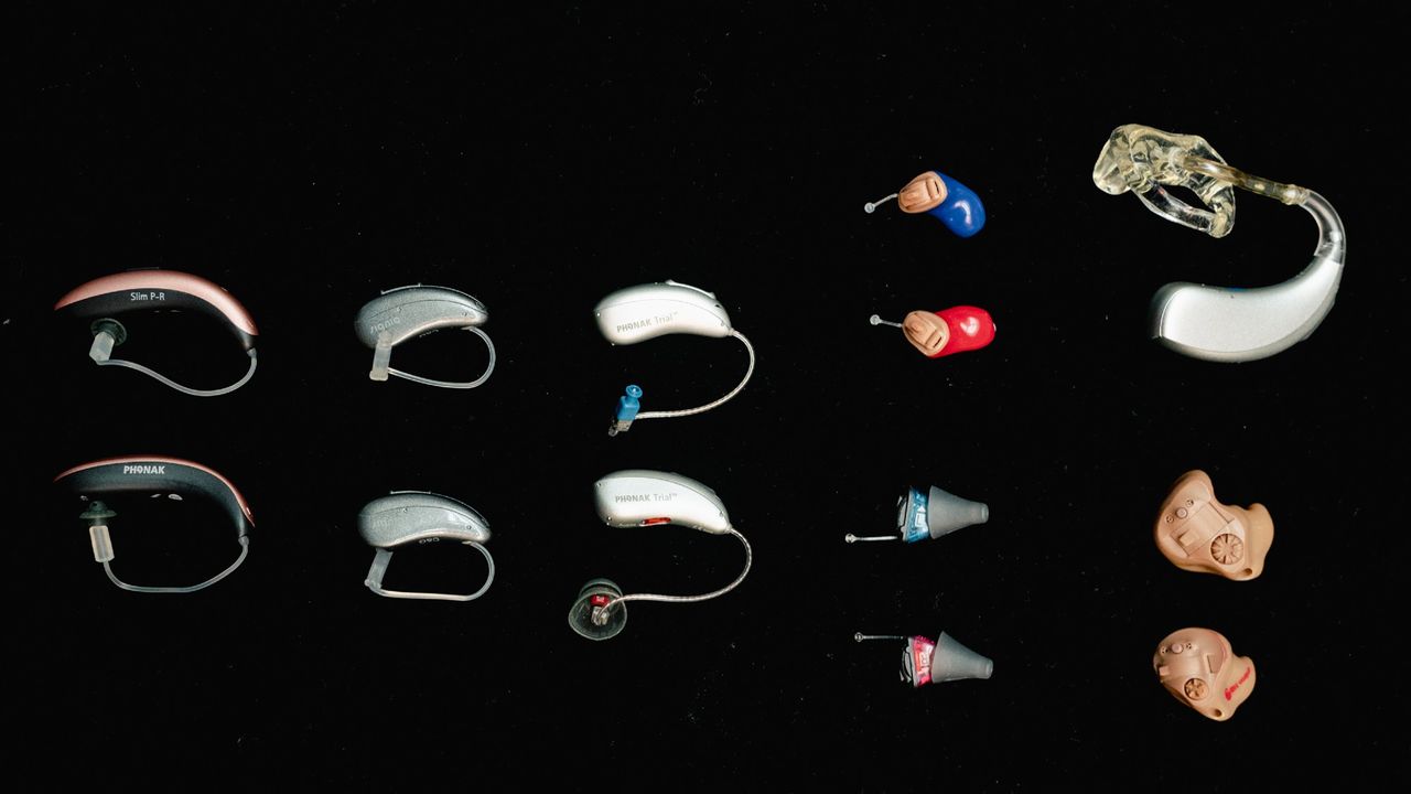 A view of different generations of hearing aids. 