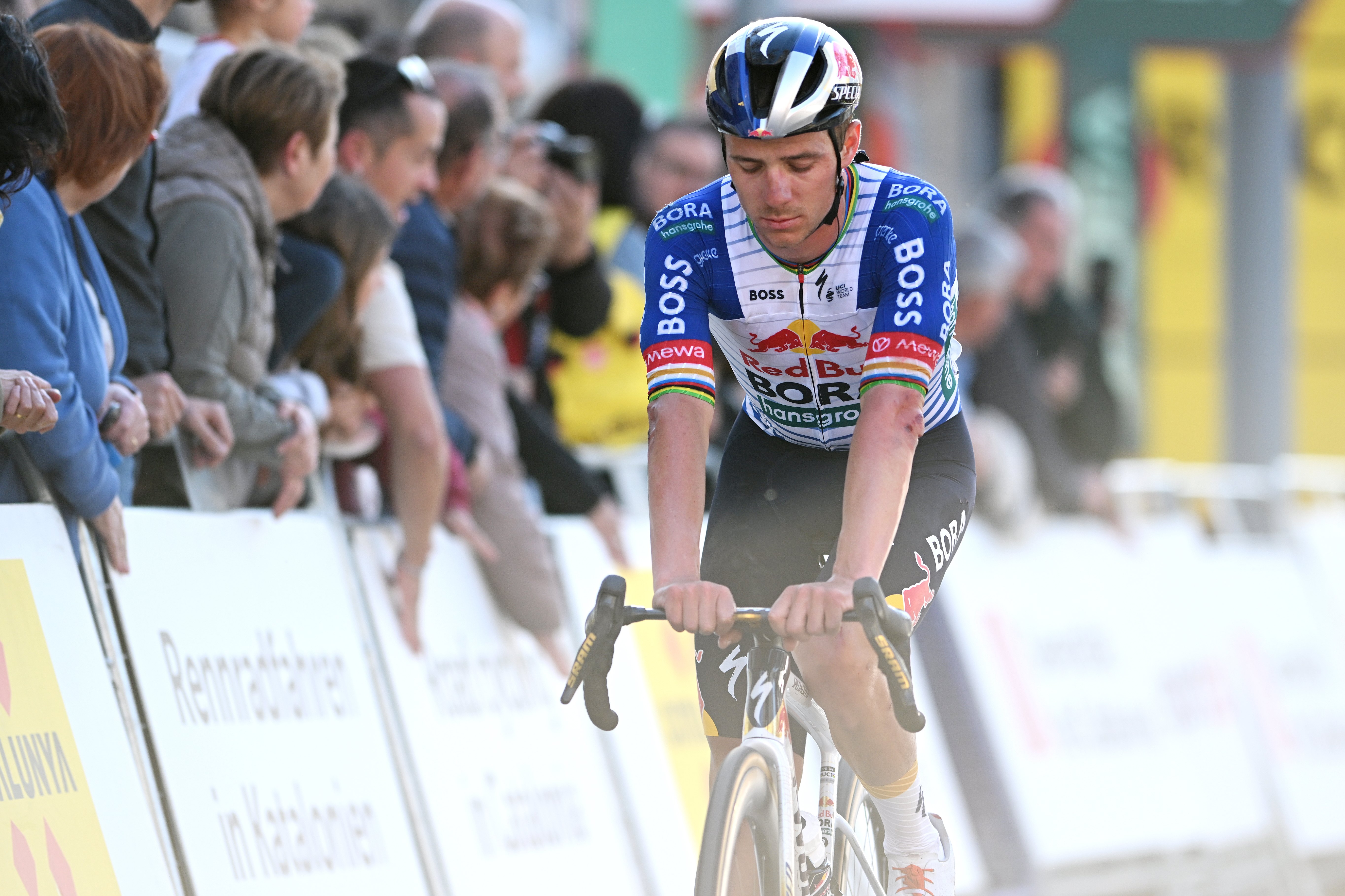 Remco Evenepoel rolls across the line after crashing when leading stage 3 of the Volta a Catalunya 2026