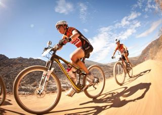 Esther Suss (front) and Jane Nuessli (rear) of BMC Wheeler during stage 1 of the 2013 Cape Epic Mountain Bike stage race