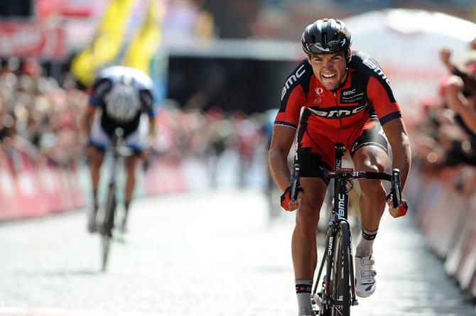 A tired Van Avermaet crossses the line