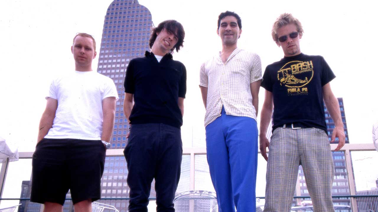 Foo Fighters standing on a rooftop, 1998