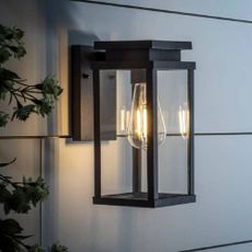 A modern, black outdoor lantern from Lights4Fun.
