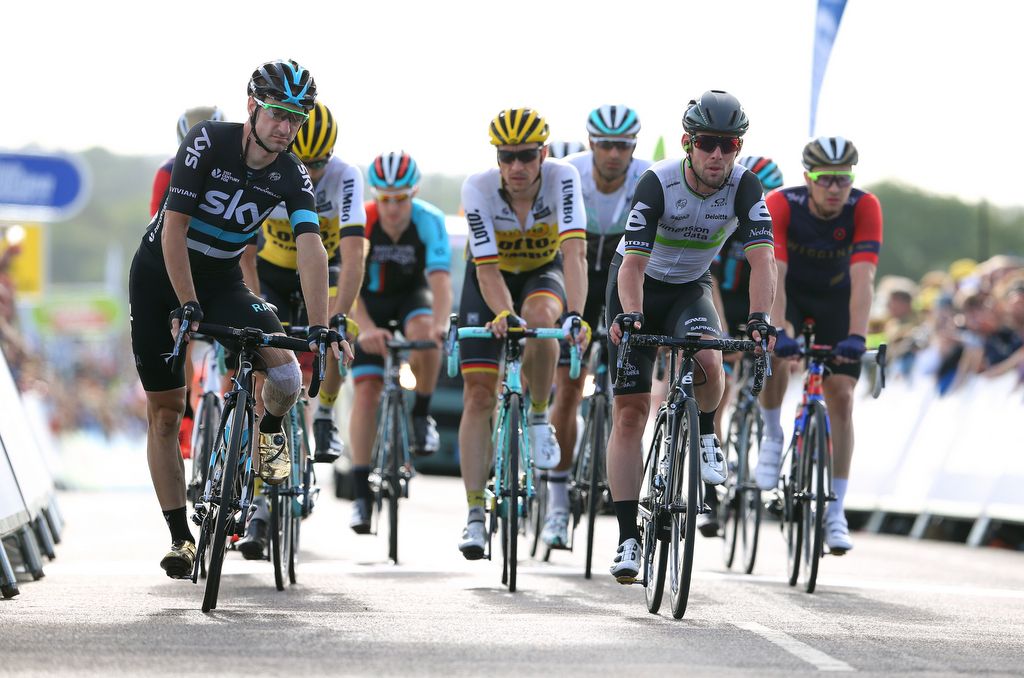 Elia Viviani and Mark Cavendish roll over the line in Bristol
