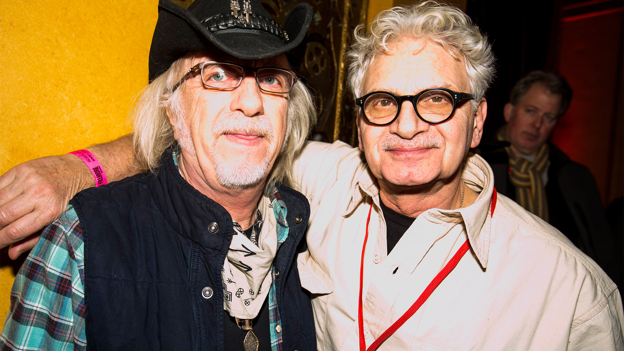 Aerosmith guitarist Brad Whitford and record producer Jack Douglas pose during The Dick Wagner "Remember the Child" Memorial Concert at The Fillmore Detroit on January 10, 2015 in Detroit, Michigan.