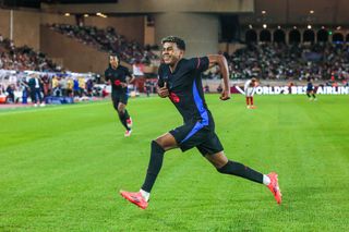 Lamine Yamal celebrates after scoring for Barcelona against Monaco in the Champions League in September 2024.