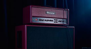 Doug Aldrich's signature amp, the Blackstar DA100, is photographed in moody low-light situations.