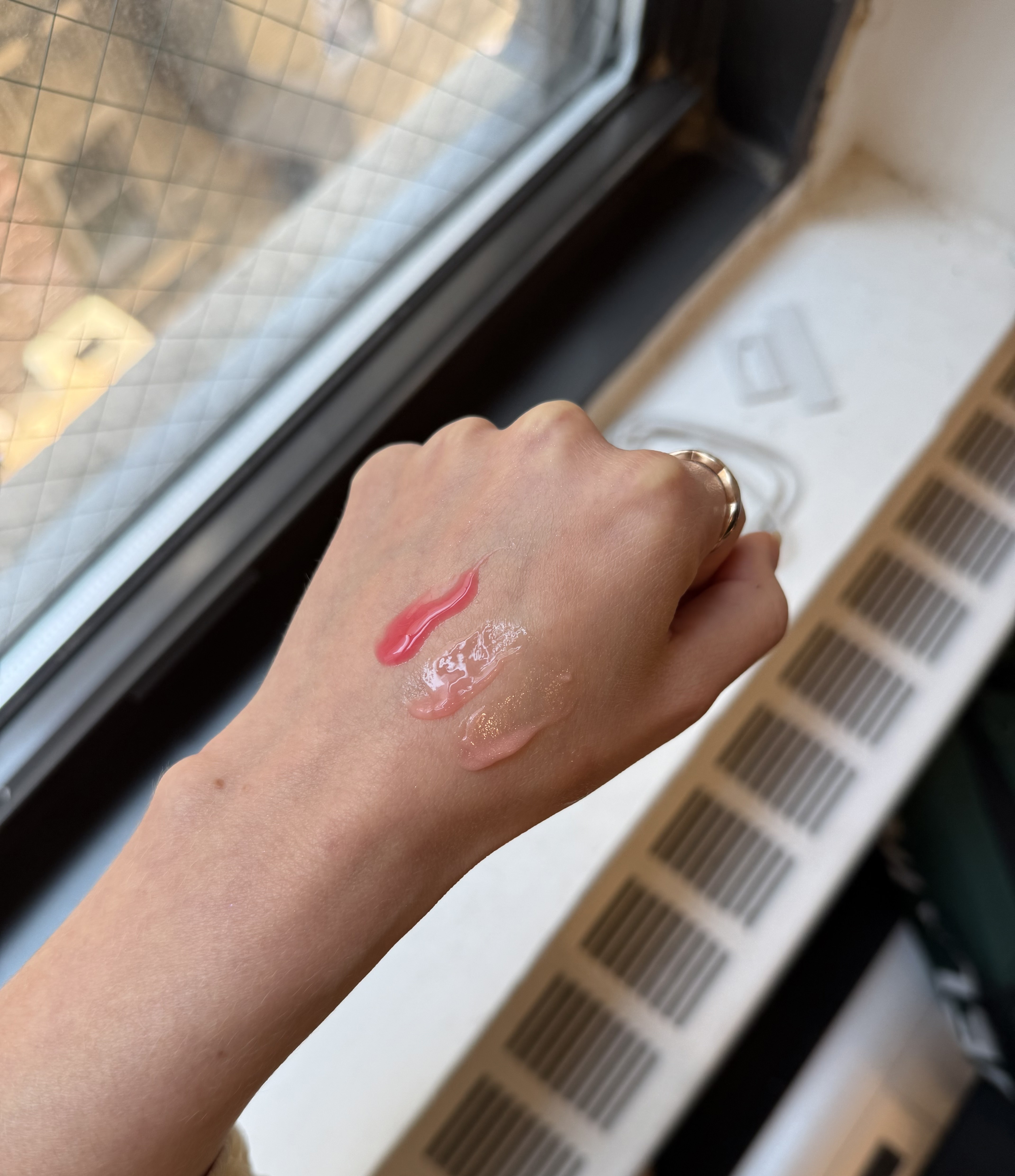 Jamie Schneider testing Summer Fridays Lip Butter Balms.
