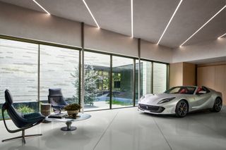 Auto lounge with car inside at Greenway House by smitharc