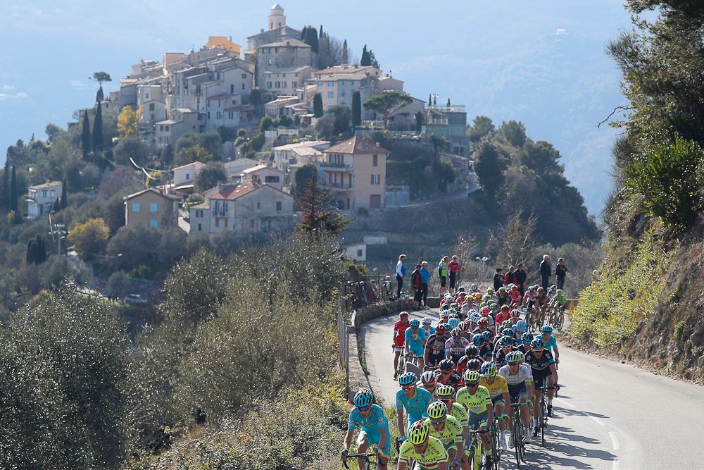 The pack rides past the village of La Roquette-sur-Var during the sixth stage of the 74th edition of the Paris-Nice