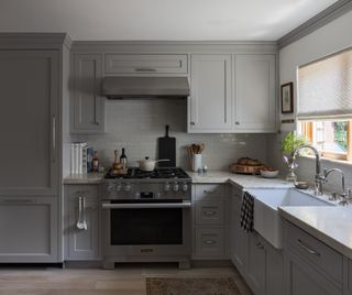 small grey kitchen by Innen Studio