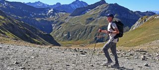 Man using Black Diamond Trail Cork Trekking Poles