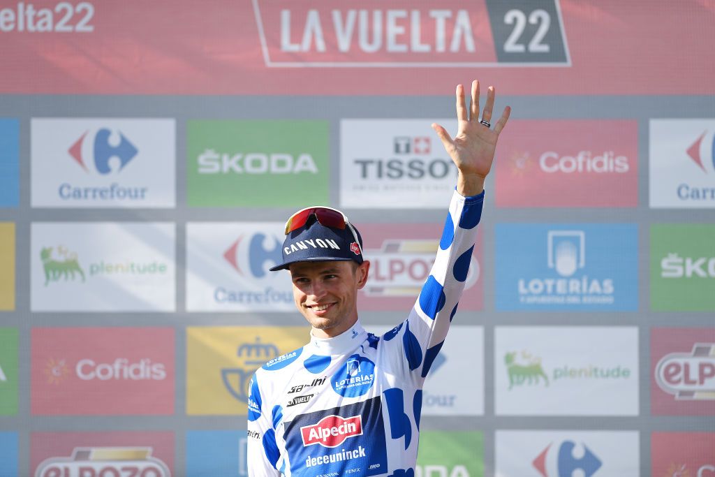 LES PRAERESNAVA SPAIN AUGUST 28 Jay Vine of Australia and Team AlpecinDeceuninck Polka Dot Mountain Jersey celebrates at podium during the 77th Tour of Spain 2022 Stage 9 a 1714km stage from Villaviciosa to Les Praeres Nava 743m LaVuelta22 WorldTour on August 28 2022 in Les Praeres Nava Spain Photo by Justin SetterfieldGetty Images