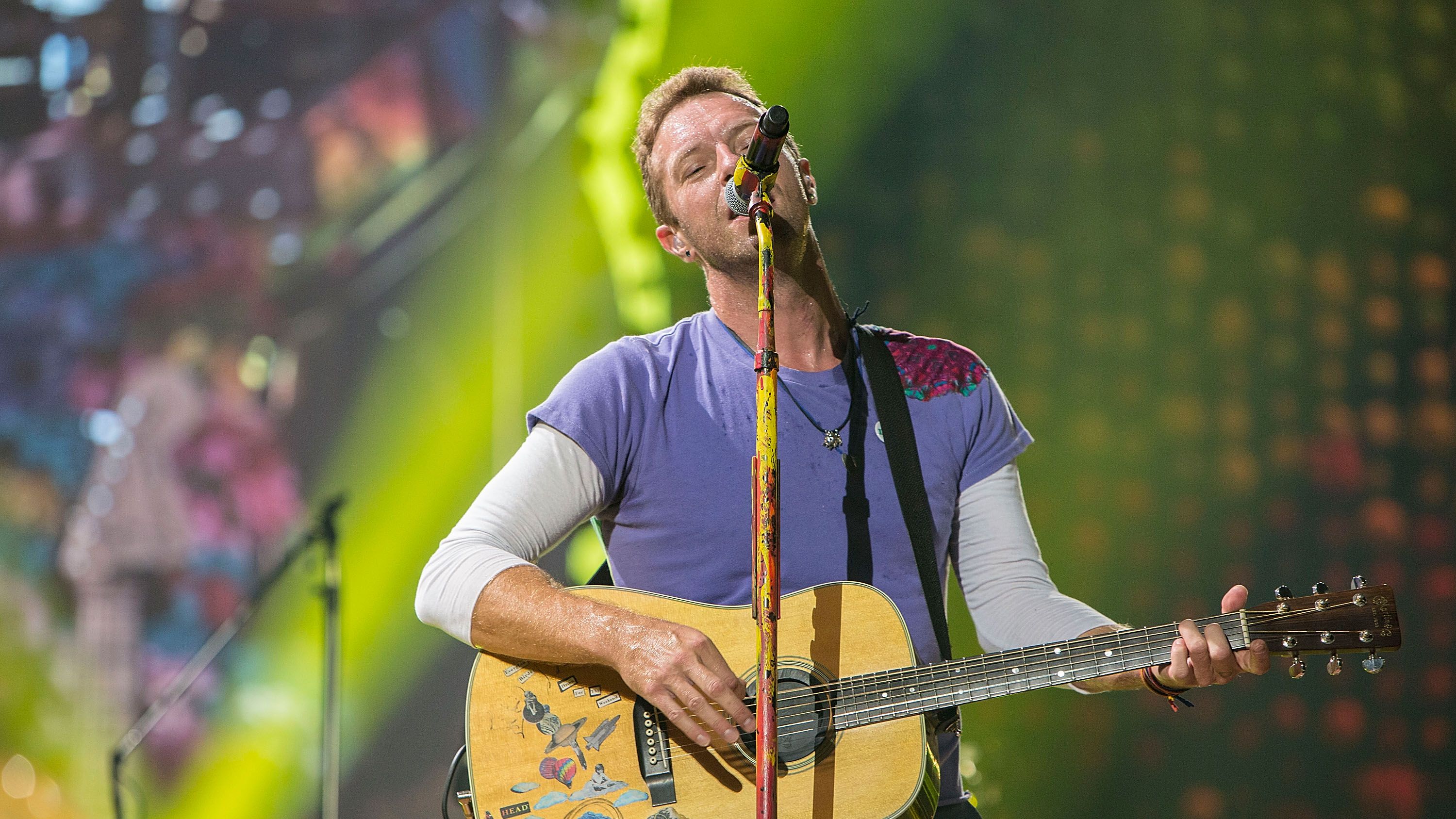 san diego, ca october 08 musician chris martin of coldplay performs on stage at sdccu stadium on october 8, 2022 in san diego, california photo by daniel knightongetty images
