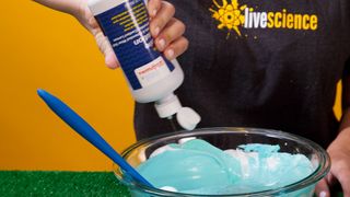 Add in your contact lens solution, a little bit at a time. The mixture will start to "transform" into slime rather quickly.