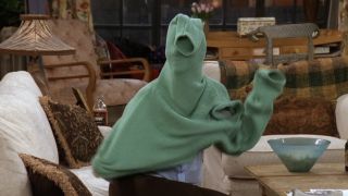 Phoebe stuck inside a sweater in Friends