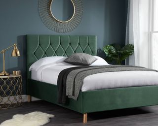 green bed with headboard