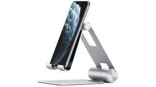 best iPad stand: Satechi R1 Aluminum Multi-Angle Foldable Tablet Stand holding iPad in front of keyboard